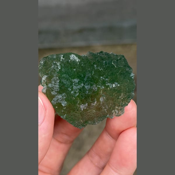 Vivid green heart-shaped stepped fluorite from Henan — complete view