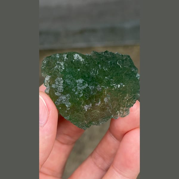 Vivid green heart-shaped stepped fluorite from Henan — alternate view