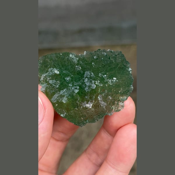 Vivid green heart-shaped stepped fluorite from Henan — alternate view