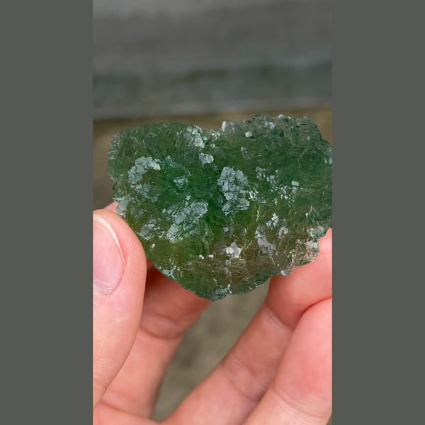 Vivid green heart-shaped stepped fluorite from Henan — detail view
