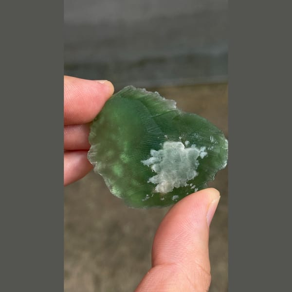 Vivid green heart-shaped stepped fluorite from Henan — detail view