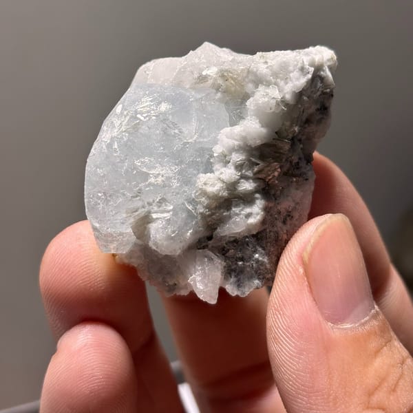 Xuebaoding aquamarine with feldspar B — alternate view