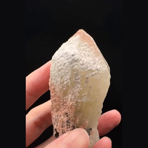 Pinkish-white coated quartz crystal with black specular hematite from Inner Mongolia — alternate view