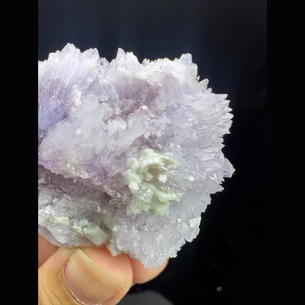 Round purple creedite and white gypsum cluster from Qinglong — alternate view