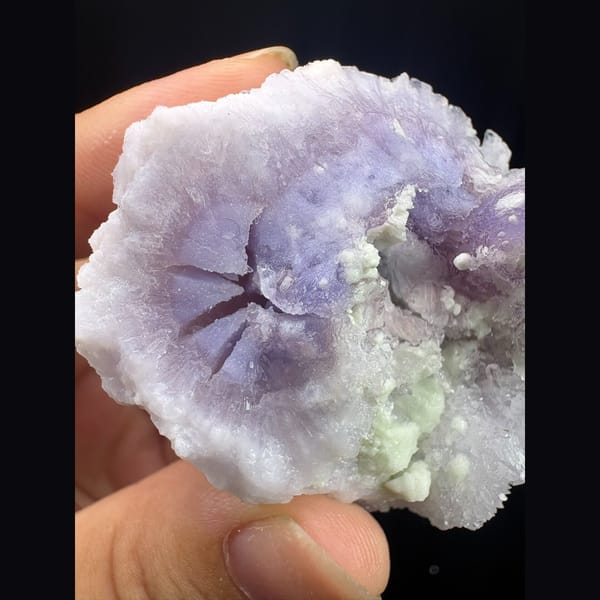 Round purple creedite and white gypsum cluster from Qinglong — alternate view