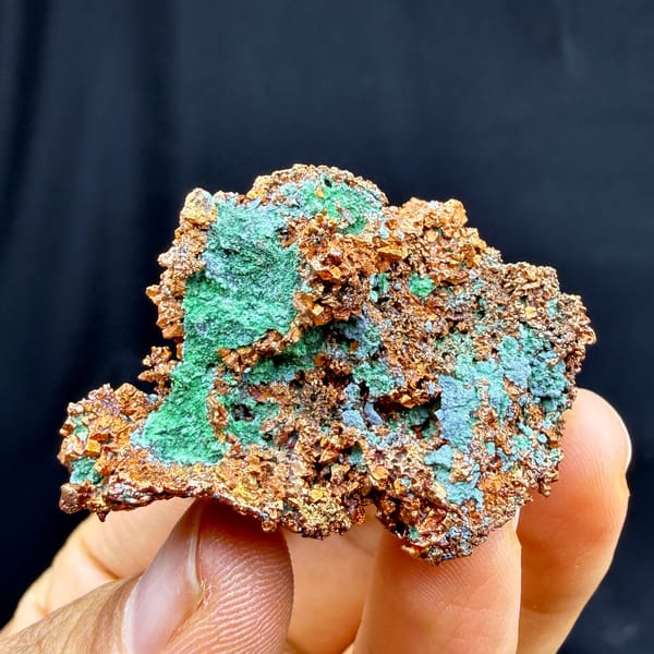Native copper crusted with green malachite — detail view