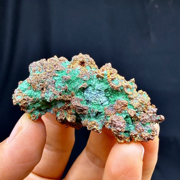 Bright green malachite crust on native copper — alternate view