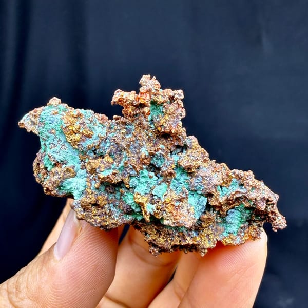 Bright green malachite crust on native copper — alternate view