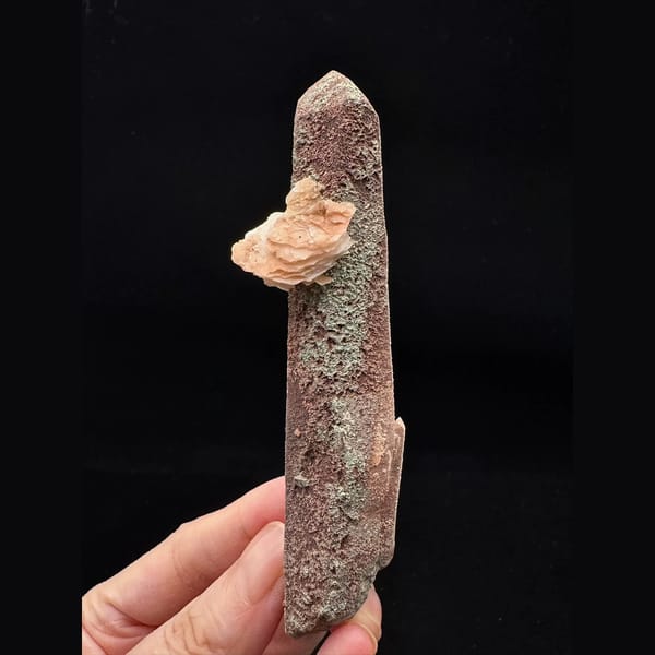 Mauve-skinned quartz floater with pink petal calcite from Inner Mongolia — complete view