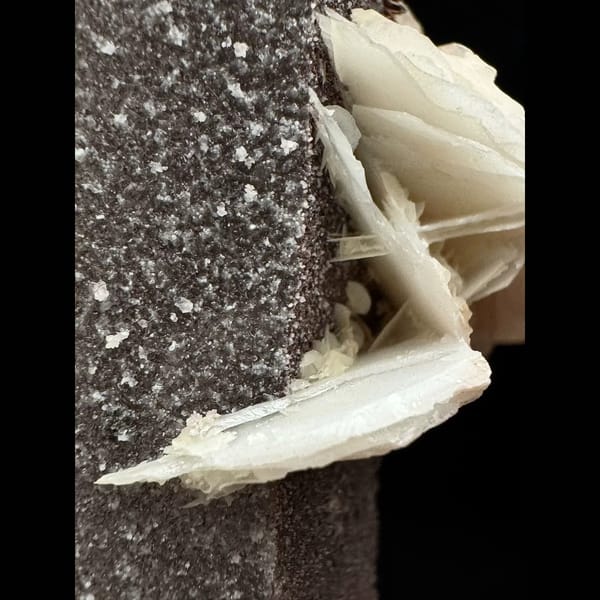 Mauve-skinned quartz floater with pink petal calcite from Inner Mongolia — detail view