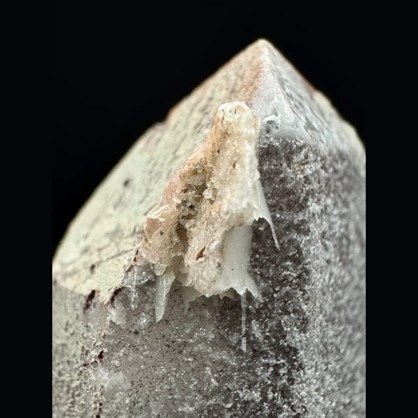 Mauve-skinned quartz floater with pink petal calcite from Inner Mongolia — detail view