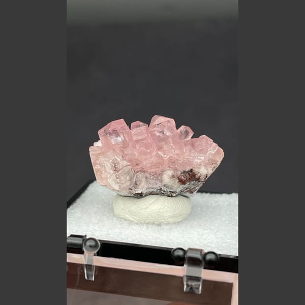 Cluster of glassy pink cobaltoan calcite from Morocco — detail view