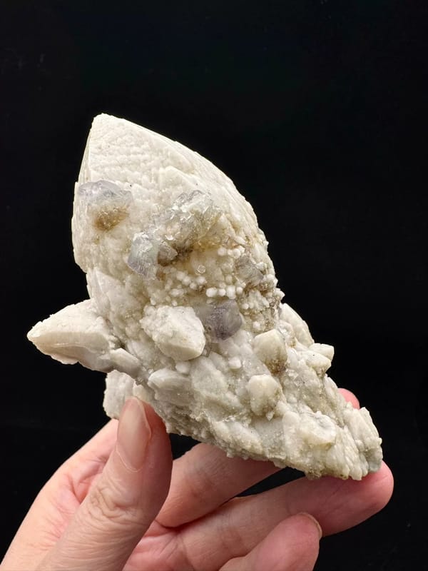 Complete side and reverse showing smaller translucent fluorite crystals on the quartz cluster