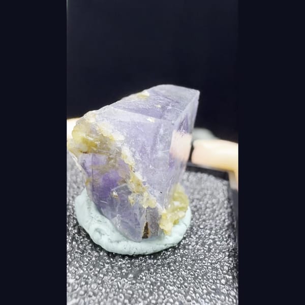 Purple fluorite crystal with golden mica from Yaogangxian, Hunan — complete view