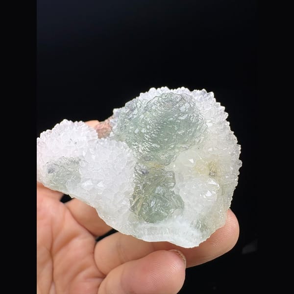 Stepped octahedral fluorite with blue cores in white quartz from Fujian — alternate view