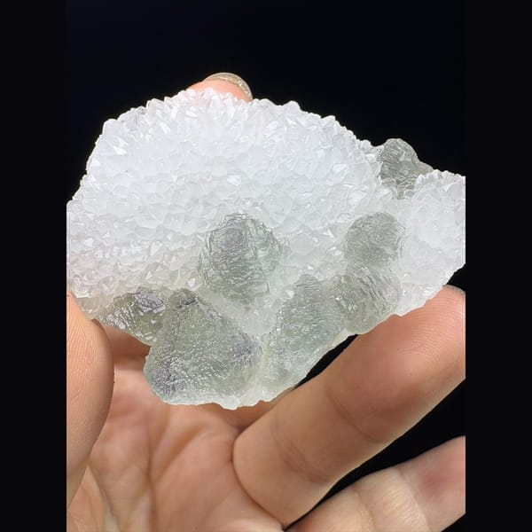 Pale green octahedral fluorite in sugary white quartz from Fujian — complete view