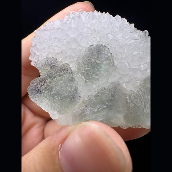 Pale green octahedral fluorite in sugary white quartz from Fujian — alternate view