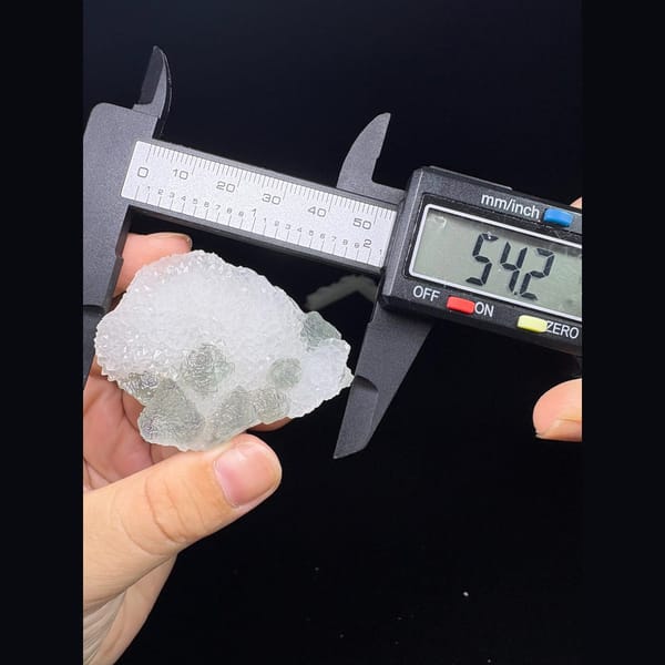 Pale green octahedral fluorite in sugary white quartz from Fujian — alternate view