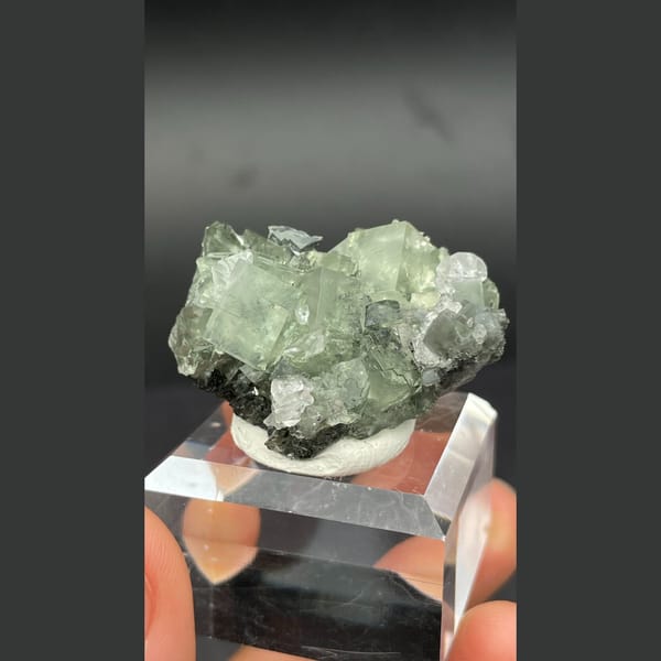 Soft green fluorite cubes with white calcite from Xianghualing, Hunan — alternate view