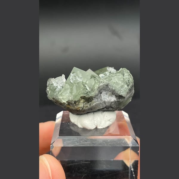 Soft green fluorite cubes with white calcite from Xianghualing, Hunan — detail view