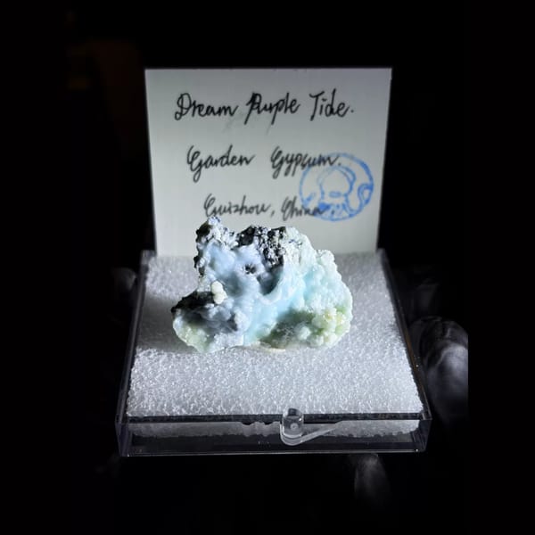 Sky blue ball creedite on black matrix — complete view