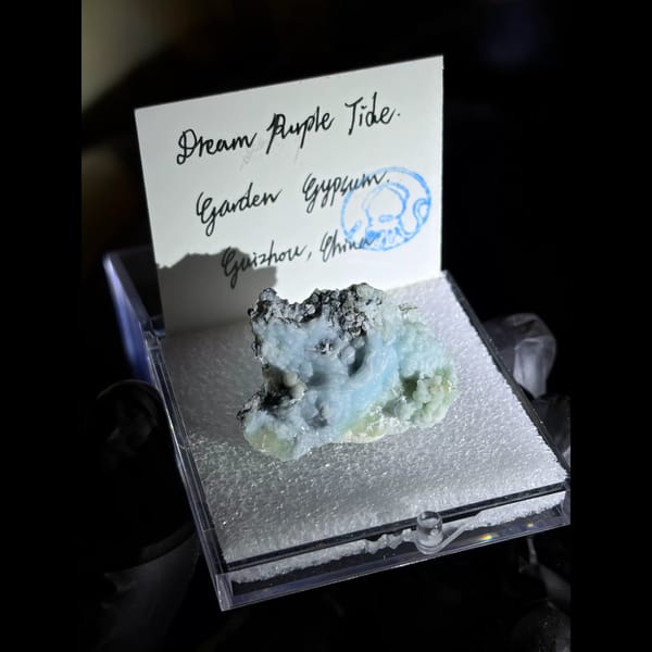 Sky blue ball creedite on black matrix — alternate view