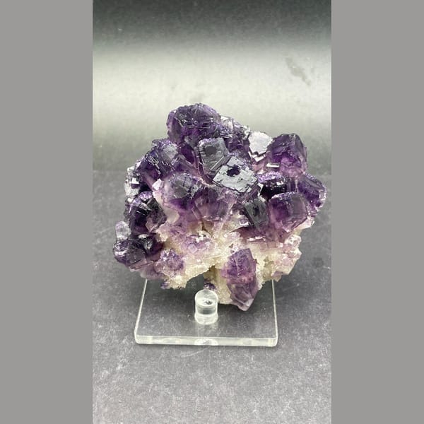 Large purple fluorite cluster with zoned cubes from Henan — alternate view