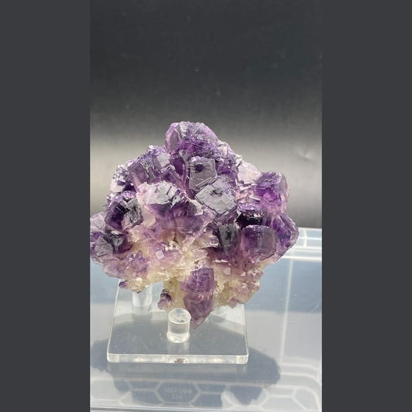 Large purple fluorite cluster with zoned cubes from Henan — alternate view