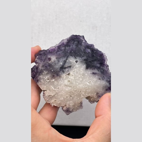 Large purple fluorite cluster with zoned cubes from Henan — detail view