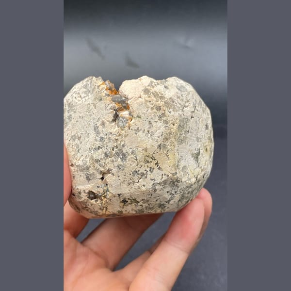 Geode lined with orange spessartine garnet, dolomite and smoky quartz from Yunxiao, Fujian — alternate view