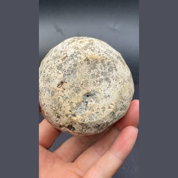 Geode lined with orange spessartine garnet, dolomite and smoky quartz from Yunxiao, Fujian — alternate view