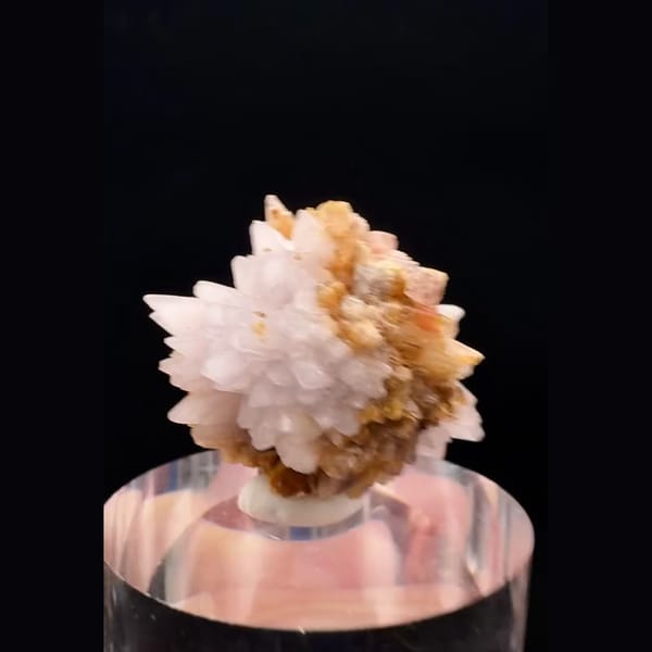 Small radiating white and honey-orange creedite ball from Guizhou — complete view