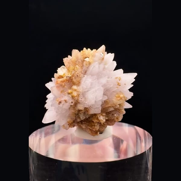 Small radiating white and honey-orange creedite ball from Guizhou — detail view