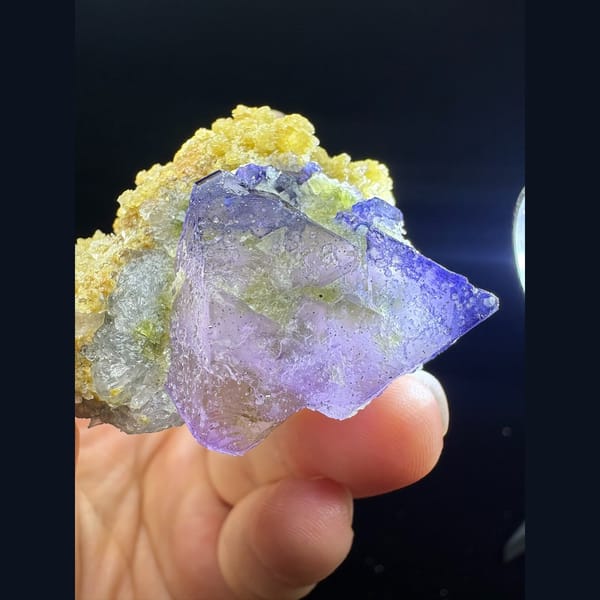 Pink and purple octahedral fluorite floater from Inner Mongolia — complete view