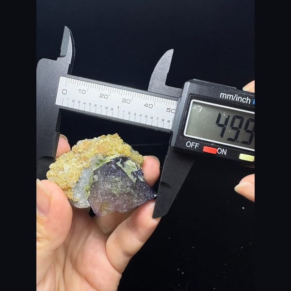 Pink and purple octahedral fluorite floater from Inner Mongolia — alternate view