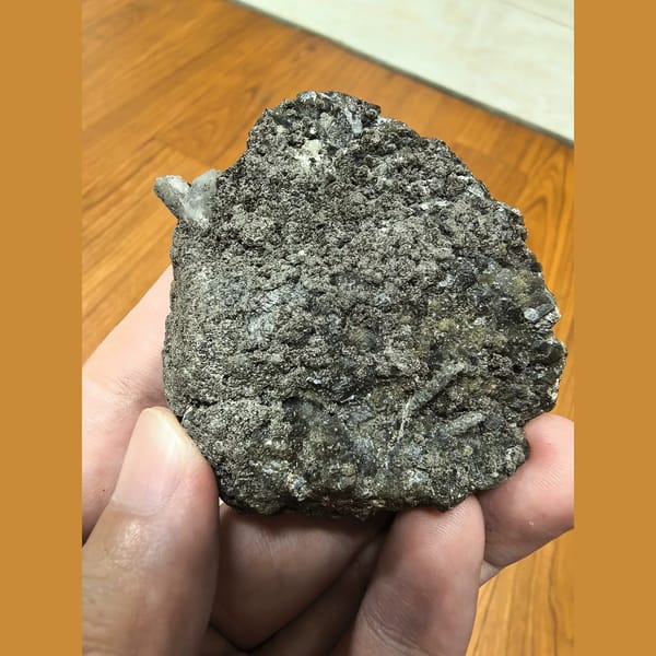 Brown garnet cluster with goethite and quartz — alternate view