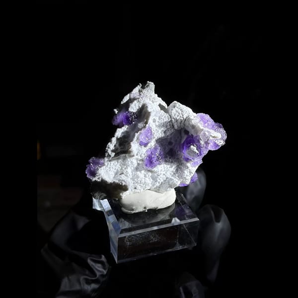 Violet octahedral fluorite on white quartz — detail view