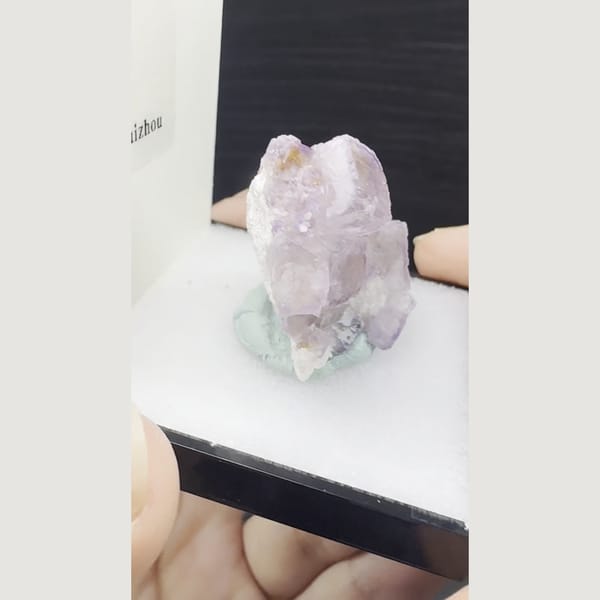 Pale purple cubic fluorite cluster from Qinglong, Guizhou — complete view