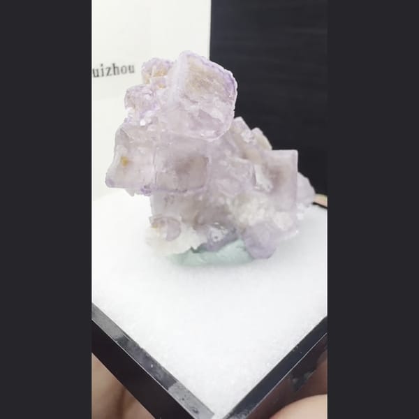 Pale purple cubic fluorite cluster from Qinglong, Guizhou — alternate view