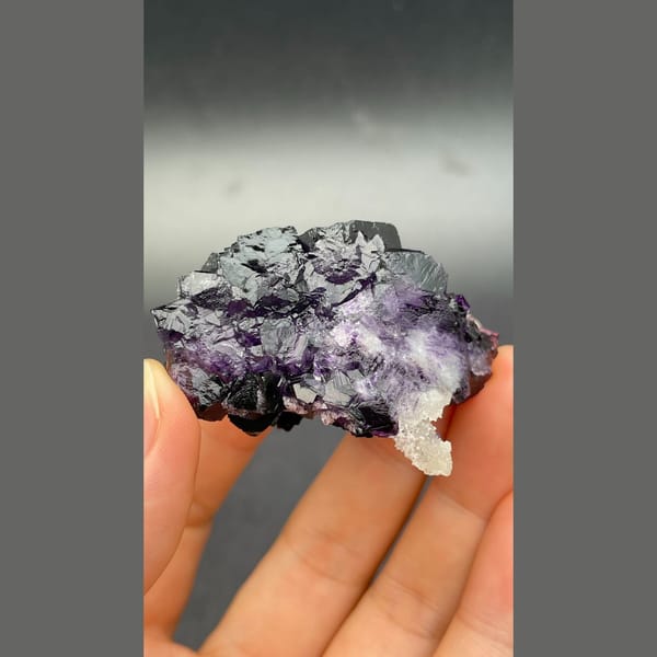 Stepped deep purple black fluorite from Henan — detail view