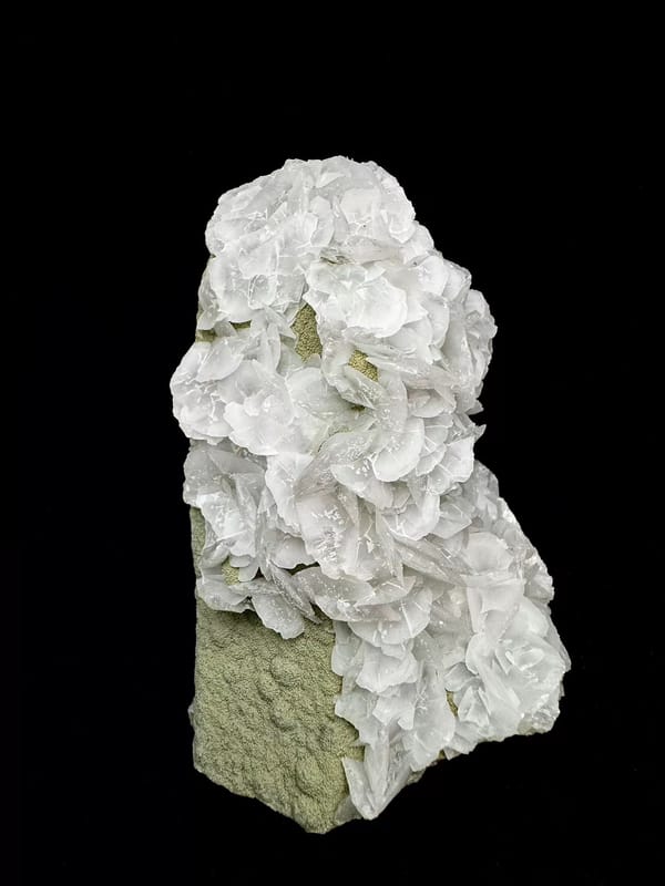 Complete opposite side showing the same calcite and quartz specimen with a broad green area