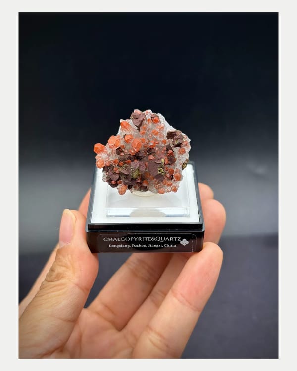 Complete front view of red quartz with chalcopyrite from Dongxiang
