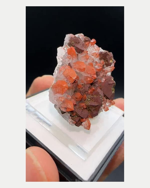 Complete left side view of red quartz with chalcopyrite