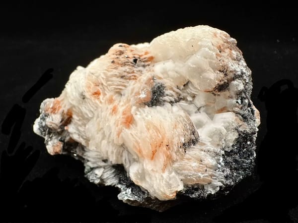 Complete alternate front angle of the same Inner Mongolia calcite and hematite specimen