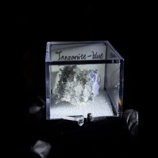 Tanzanite-blue fluorite with needle quartz — detail view