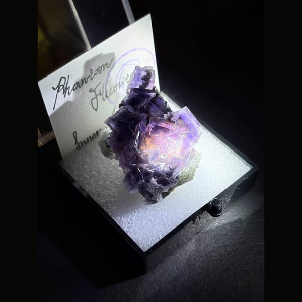 Violet phantom fluorite with pink core — alternate view