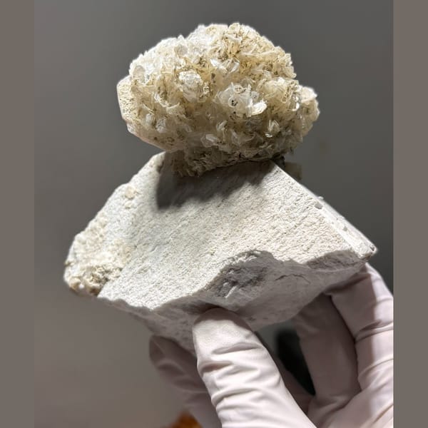 Pakistan mica ball with feldspar — complete view