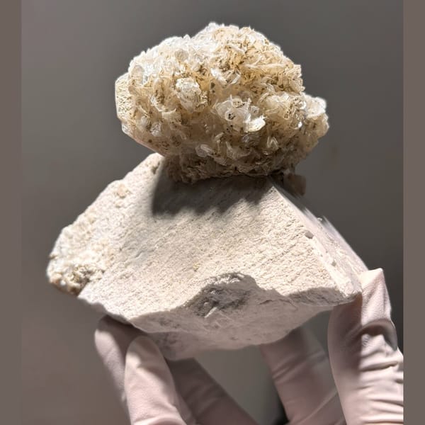 Pakistan mica ball with feldspar — detail view