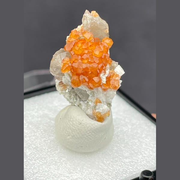 Fanta-orange garnet with quartz from Fujian — alternate view