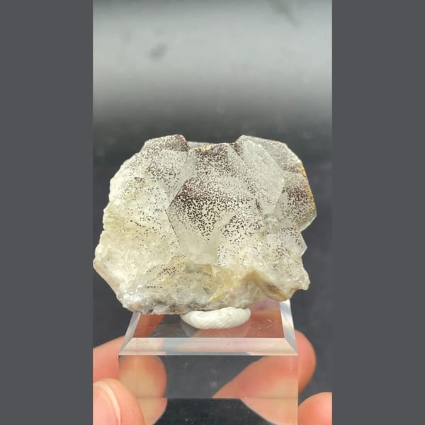 Fluorescent calcite with pyrite from Hunan — complete view